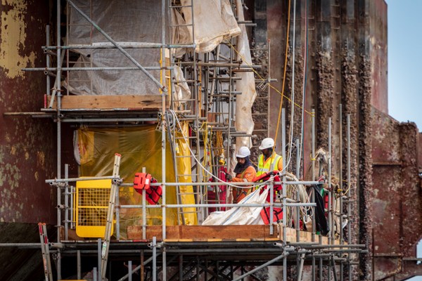 men working on building
